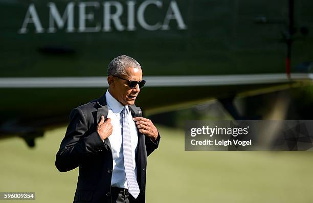 President Obama departs Marine One and walks toward the Oval Office after visiting wounded service members at Walter Reed National Military Medical...