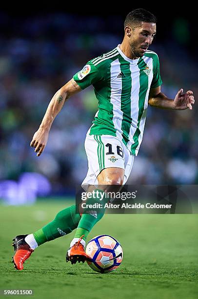 Alvaro Cejudo of Real Betis Balompie in action during the match between Real Betis Balompie v RC Deportivo La Coruna as part of La Liga at Estadio...