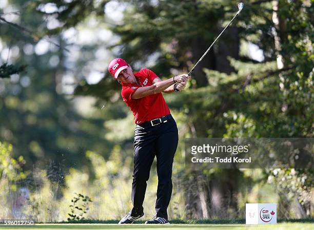 Lori Kane of Canada tees off on the 8th hole during the second round of the Canadian Pacific Women's Open at Priddis Greens Golf and Country Club on...