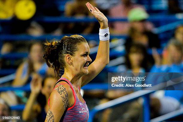 Agnieszka Radwanska of Poland celebrates after defeating Petra Kvitova of the Czech Republic on day 6 of the Connecticut Open at the Connecticut...