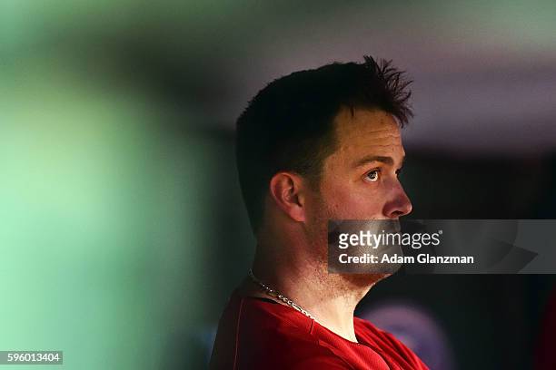 Steven Wright of the Boston Red Sox looks on from the dugout in the fifth inning during a game against the Kansas City Royals on August 26, 2016 at...