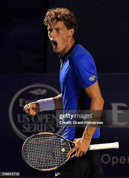 Pablo Carreno Busta of Spain reacts after his win over John Millman of Australia in the semifinals of the Winston-Salem Open at Wake Forest...