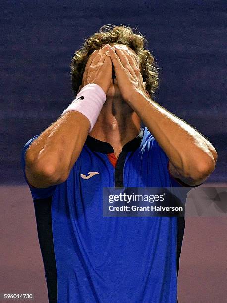 Pablo Carreno Busta of Spain reacts after his win over John Millman of Australia in the semifinals of the Winston-Salem Open at Wake Forest...