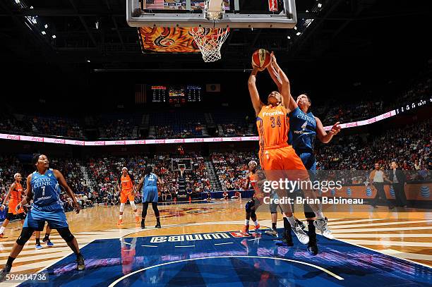 Kelly Faris of the Connecticut Sun shoots the ball against the Minnesota Lynx on August 26, 2016 at the Mohegan Sun Arena in Uncasville, Connecticut....