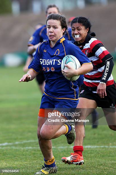 Michaela Baker of Otago makes a break during the round four Farah Palmer Cup match between Otago and Counties Manukau at University Oval on August...