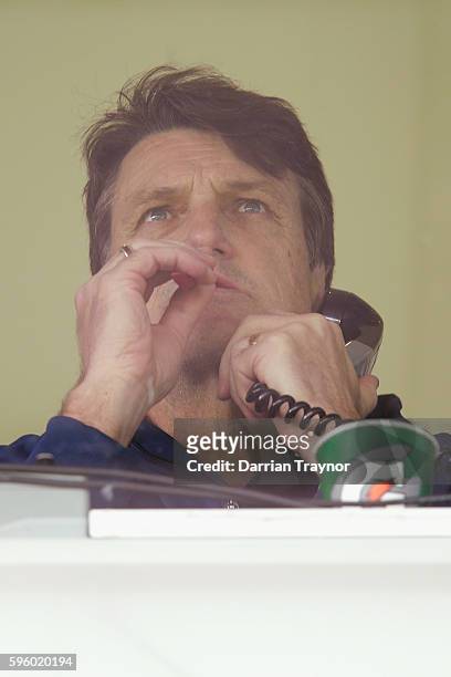 Paul Roos, Senior Coach of the Demons looks on during the round 23 AFL match between the Geelong Cats and the Melbourne Demons at Simonds Stadium on...