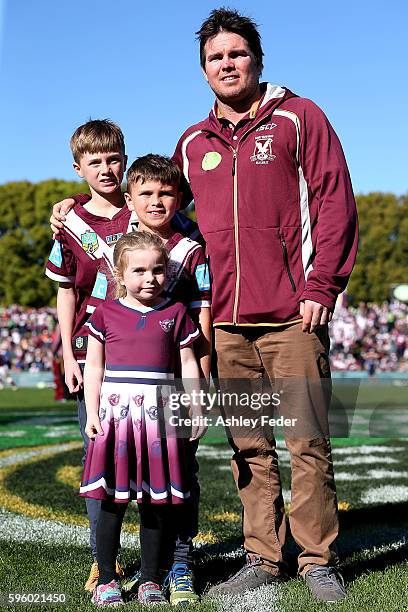Jamie Lyon poses for a photo with his family during the round 25 NRL match between the Manly Sea Eagles and the Canberra Raiders at Brookvale Oval on...