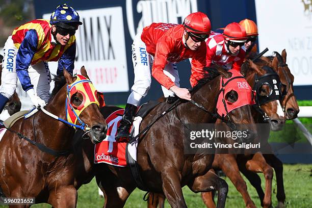 Mark Zahra riding Redzel defeats Nicholas Hall riding Under the Louvre in Race 5, The Resimax Stakes during Melbourne Racing at Caulfield Racecourse...