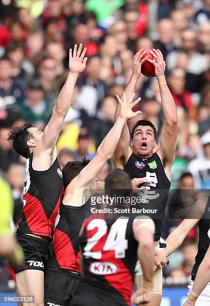 Matthew Kreuzer of the Blues takes a mark during the round 23 AFL match between the Essendon Bombers and the Carlton Blues at Melbourne Cricket...