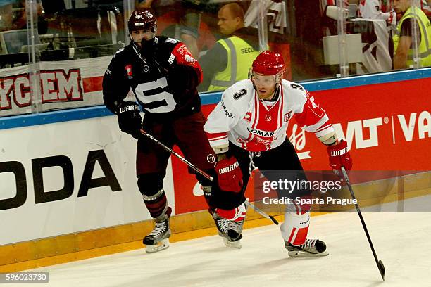 Dominik Uher of HC Sparta Prague and Michael Kolarz of Comarch Cracovia during the Champions Hockey League match between Sparta Prague and Comarch...