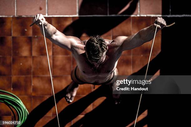 In this handout image provided by Red Bull, Artem Silchenko of Russia warms up during the first training session of the fifth stop of the Red Bull...