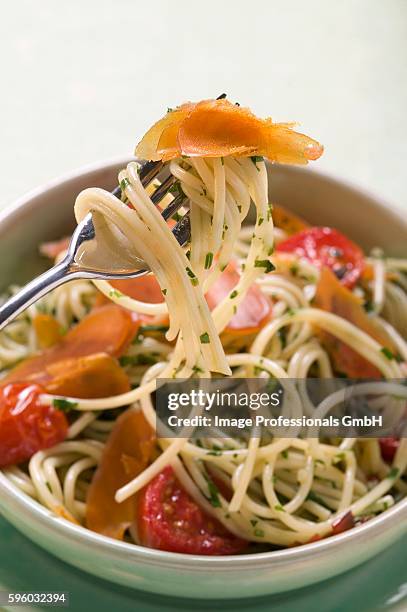 spaghetti with bresaola and tomatoes - bresaola stock pictures, royalty-free photos & images