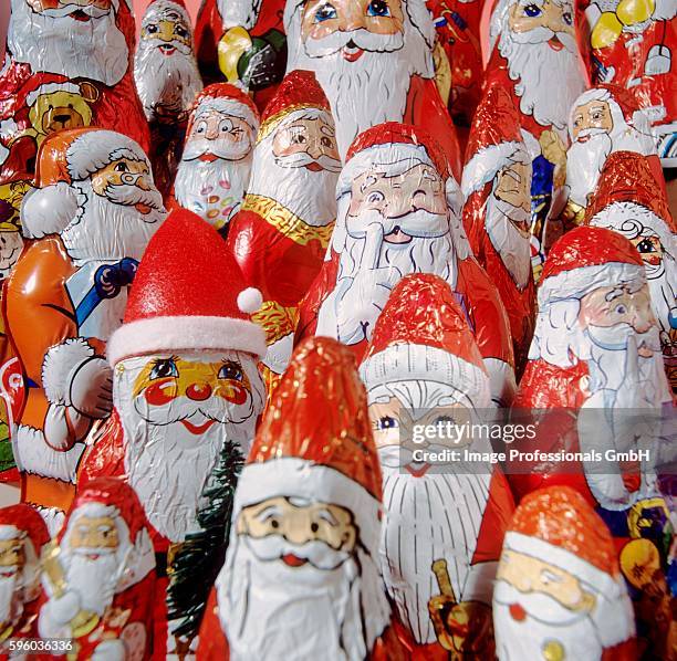 assorted chocolate santas - convenience chocolate stock pictures, royalty-free photos & images