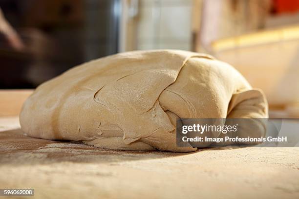bread dough on a floured work surface - floured surface stock pictures, royalty-free photos & images