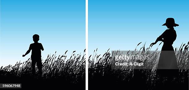 小麦草の中で遊ぶ子供たち - 男の子　逆光　ひとり点のイラスト素材／クリップアート素材／マンガ素材／アイコン素材