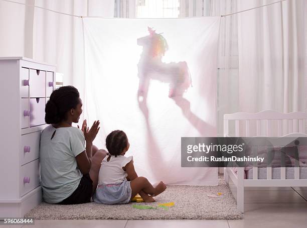 home puppet show time. - unicorn stock pictures, royalty-free photos & images