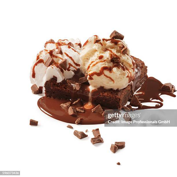 brownie sundae on a white background - whip cream dollop stock pictures, royalty-free photos & images