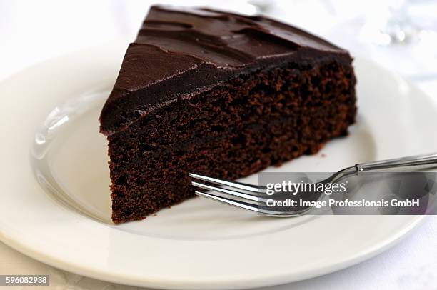 a piece of chocolate cake - sponge cake stock pictures, royalty-free photos & images