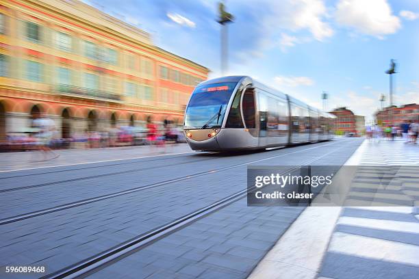 straßenbahn, schwenken, bewegung und zoom in nizza verschwommen - straßenbahn stock-fotos und bilder