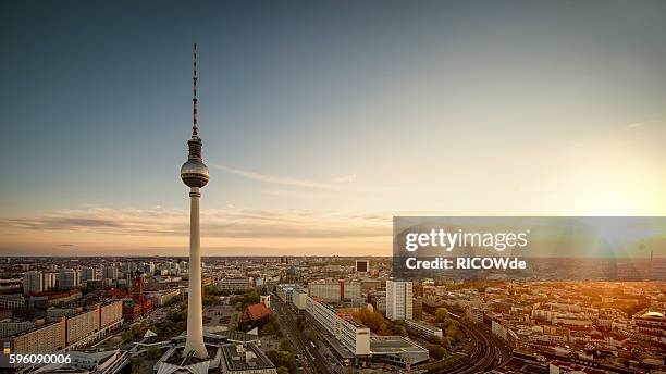 berlin tv tower at sunset - berlin luftaufnahme stock-fotos und bilder