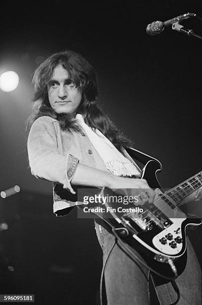 Bassist and singer Geddy Lee performing with Canadian progressive rock group, Rush, at the Civic Center in Springfield, Massachusetts, during the...