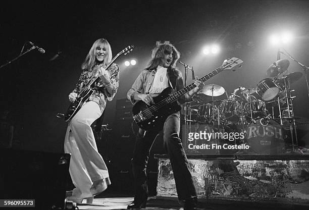 Alex Lifeson and Geddy Lee performing with Canadian progressive rock group, Rush, at the Civic Center in Springfield, Massachusetts, during the...