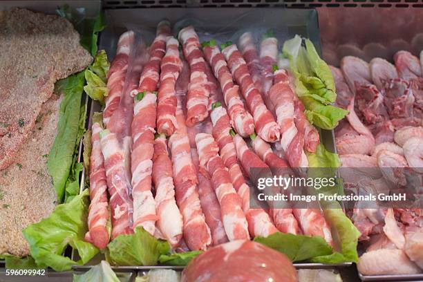 prosciutto wrapped asparagus in a display case at a market in palermo, sicily - prosciutto wrapped stock pictures, royalty-free photos & images