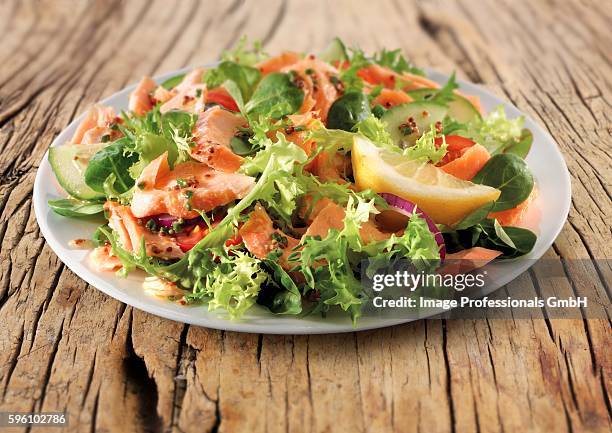 salmon salad - curly endive stock pictures, royalty-free photos & images