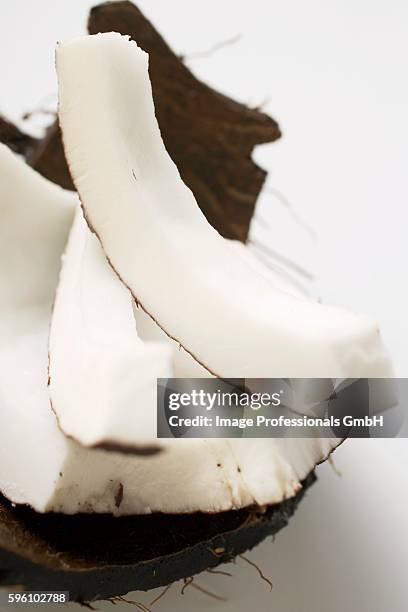 coconut, cut into pieces - coconut chunks stock pictures, royalty-free photos & images