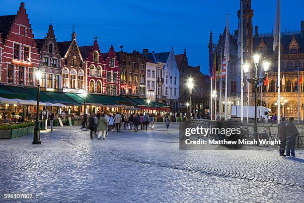 the city center of bruges at night. - bruges buildings stock pictures, royalty-free photos & images