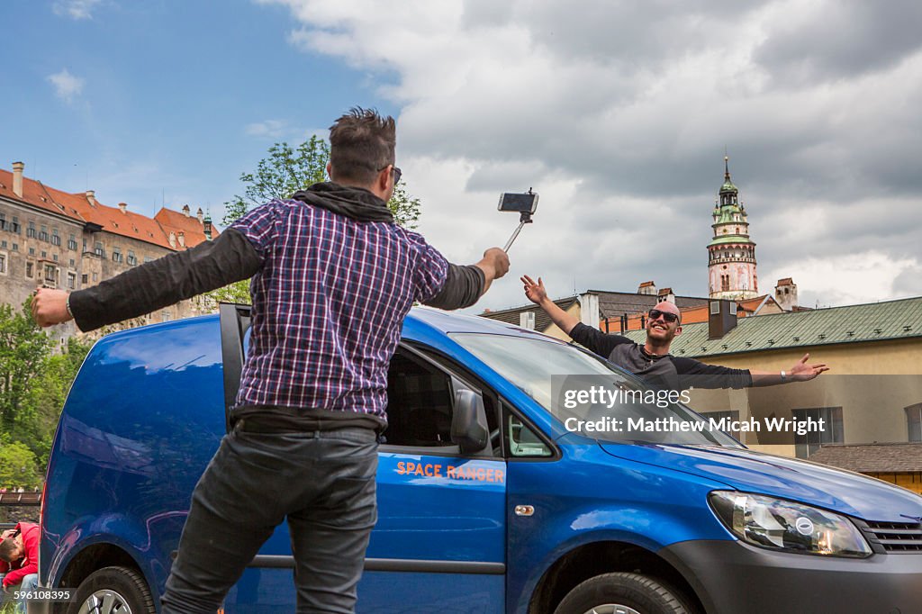 Posing for a photo in front of this Czech castle.