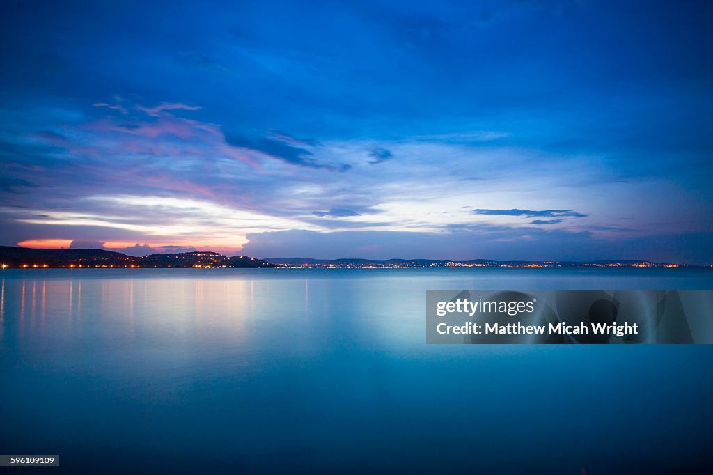 Photograph a sunset at Lake Balaton.