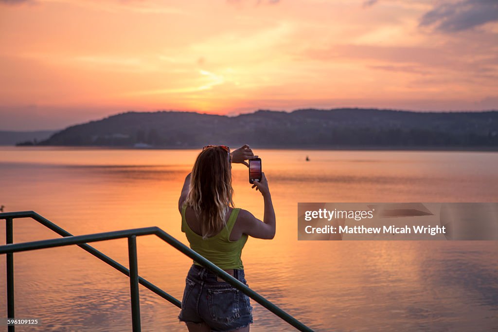 Photograph a sunset at Lake Balaton.