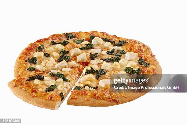 spinach and feta cheese pizza sliced once on a white background - fetta stockfoto's en -beelden