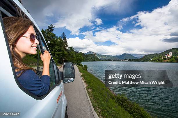 the iconic church on the lake in bled - mini van stock pictures, royalty-free photos & images