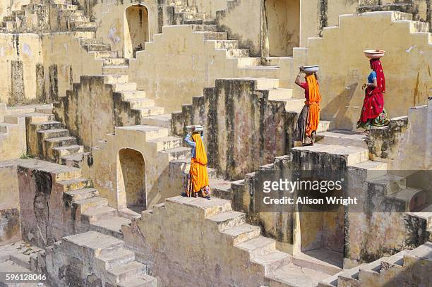 water wells - rajasthani women stock pictures, royalty-free photos & images