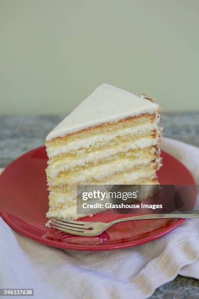 slice of coconut cake - cake slices stock-fotos und bilder