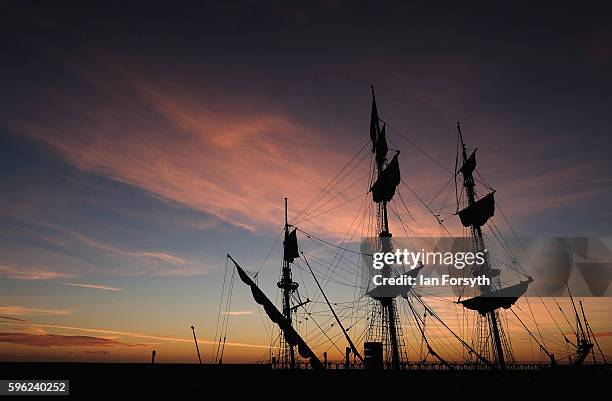 Masts and rigging are seen against the first light of dawn as ships are moored in the harbour during the North Sea Tall Ships Regatta on August 27,...