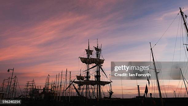 Masts and rigging are seen against the first light of dawn as ships are moored in the harbour during the North Sea Tall Ships Regatta on August 27,...