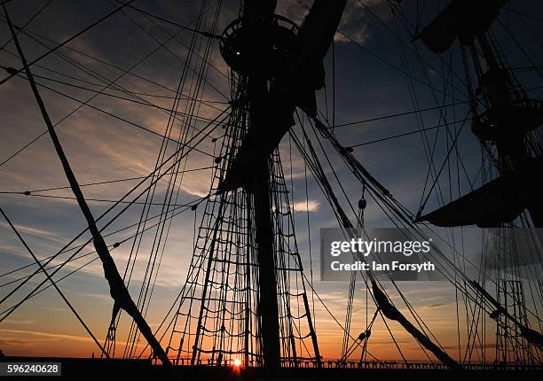 Masts and rigging are seen against the first light of dawn as ships are moored in the harbour during the North Sea Tall Ships Regatta on August 27,...