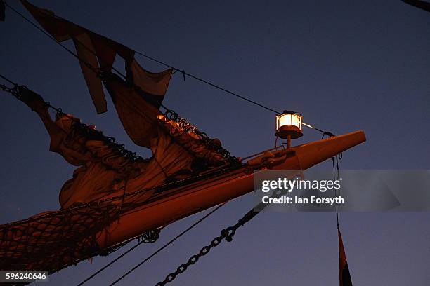 Light on a bowsprit of a ship shines in the early morning during the North Sea Tall Ships Regatta on August 27, 2016 in Blyth, England. The bustling...