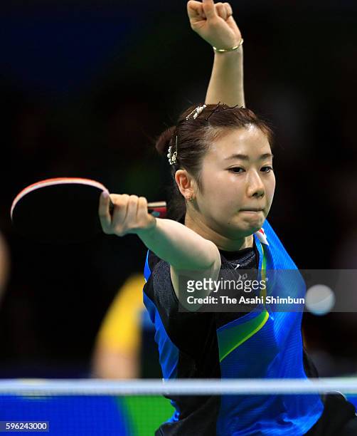Ai Fukuhara of Japan competes against Daniela Monteiro Dodean of Romania during Round 3 of the Women's Singles Table Tennis on Day 3 of the Rio 2016...