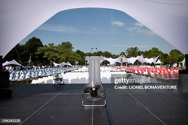 An empty rostrum is displayed on stage prior to a speech by French right-wing Les Republicains party's mayor of Bordeaux and candidate for the LR...
