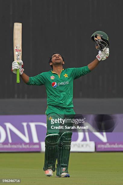 Sarfraz Ahmed of Pakistan celebrates reaching a century during the 2nd One Day International at Lord's Cricket Ground on August 27, 2016 in London,...