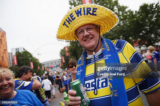 Warrington Wolves supporter prior to the start of the Ladbrokes Challenge Cup Final between Hull FC and Warrington Wolves at Wembley Stadium on...