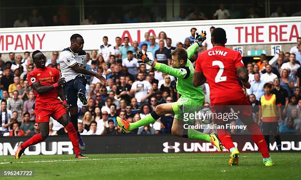 Danny Rose of Tottenham Hotspur scores his sides first goal past Simon Mignolet of Liverpool during the Premier League match between Tottenham...