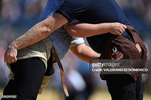 Athletes fight during the first day of the Federal Alpine Wrestling Festival on August 27 in Payerne, western of Switzerland. More than 200,000...