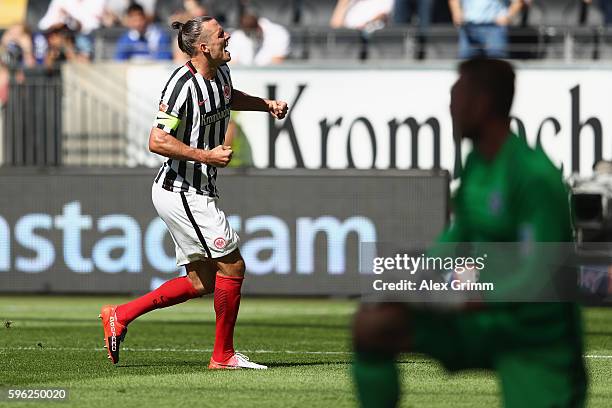 Alexander Meier of Frankfurt celebrates his team's first goal during the Bundesliga match between Eintracht Frankfurt and FC Schalke 04 at...