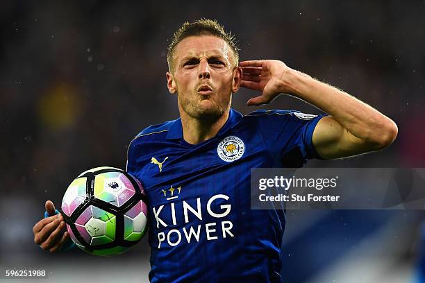 Jamie Vardy of Leicester City celebrates scoring his sides first goal during the Premier League match between Leicester City and Swansea City at The...
