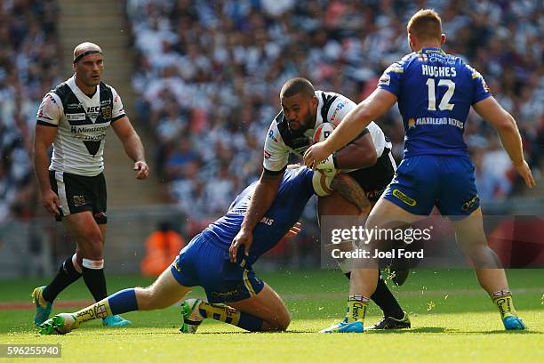 Frank Pritchard of Hull FC tries to break through a tackle during the Ladbrokes Challenge Cup Final between Hull FC and Warrington Wolves at Wembley...